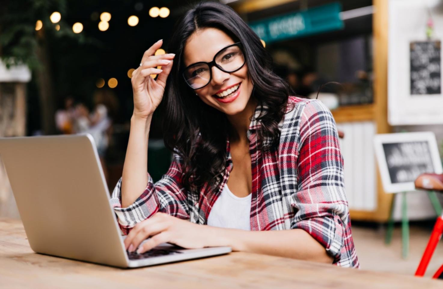 Business professionals analyzing financial data and working capital metrics in modern office setting